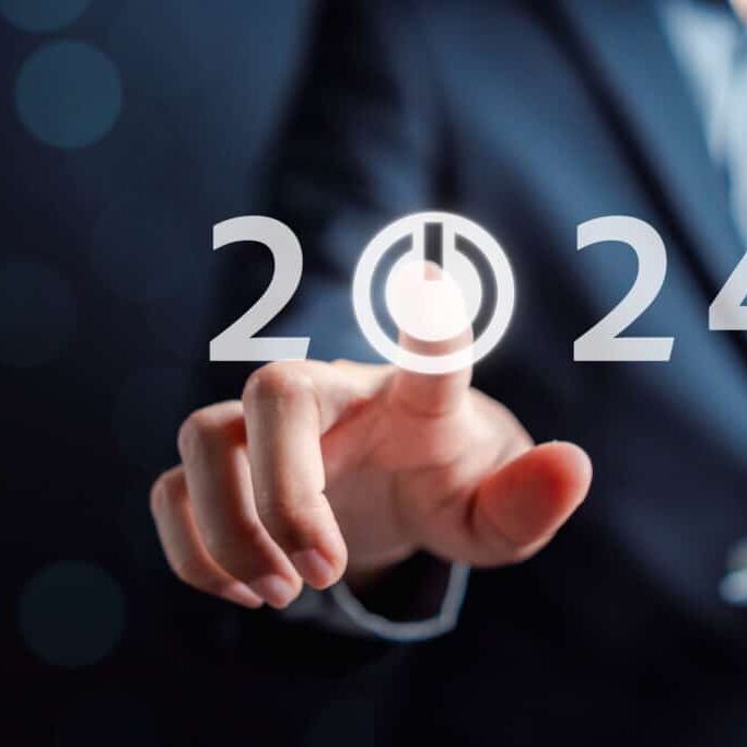 Happy new year Start 2024 from 2023 ,Finger hand of businessman start button 2024 planning business strategy, opportunity and change in future trends. Happy new year Start 2024 from 2023 ,Finger hand of businessman start button 2024 planning business strategy, opportunity and change in future trends.